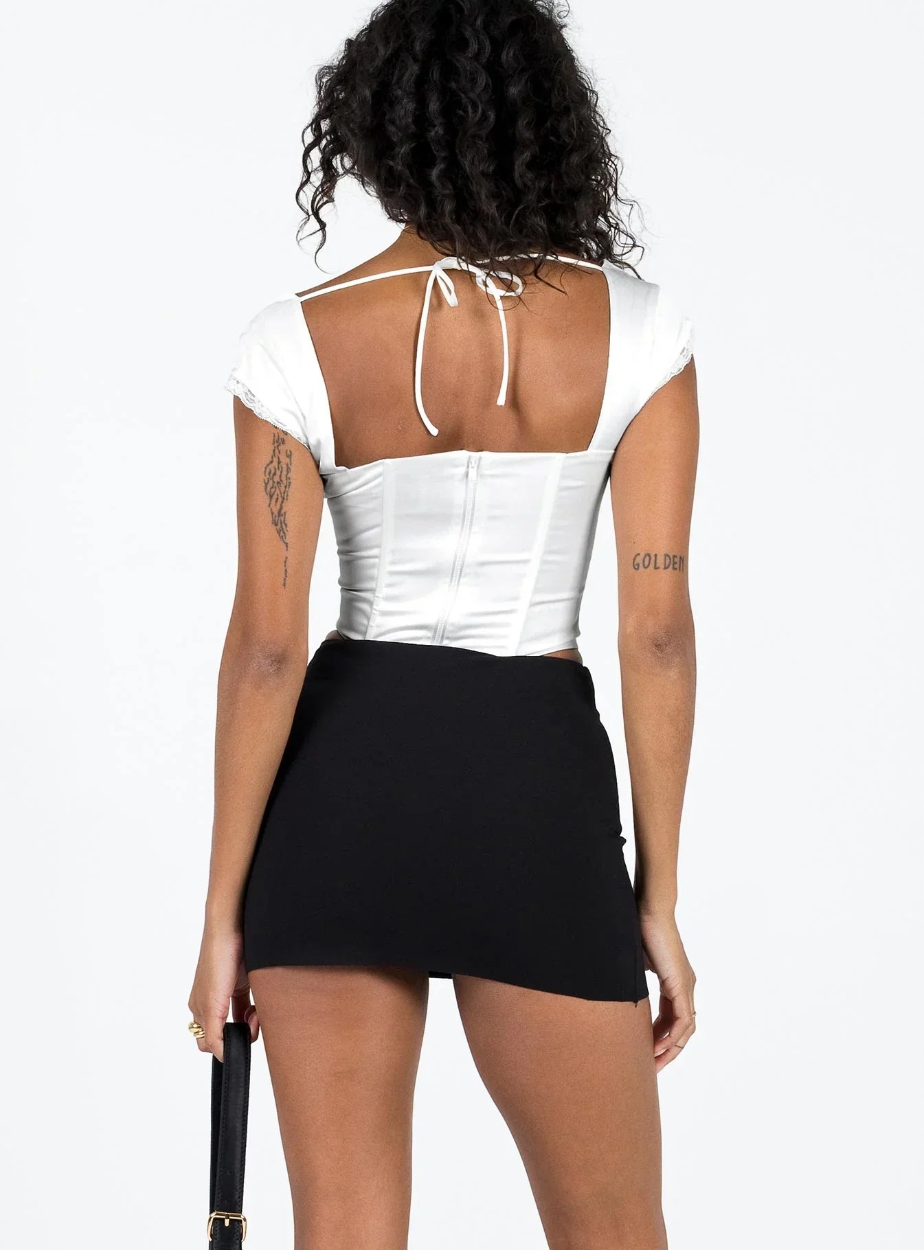 Karley Low-Waist Mini Skirt – Sleek Black Y2K-Inspired Essential