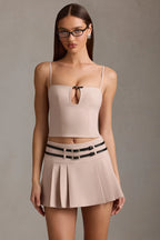 Belted Low-Rise Pleated Mini Skirt in Mushroom
