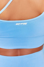 Evolve Seamless Asymmetric Crop Top in Light Blue